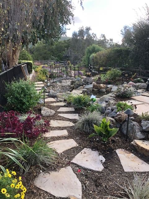 Gallery photos for Serene Garden Retreat with Stone Paths and Water Feature: Image #2